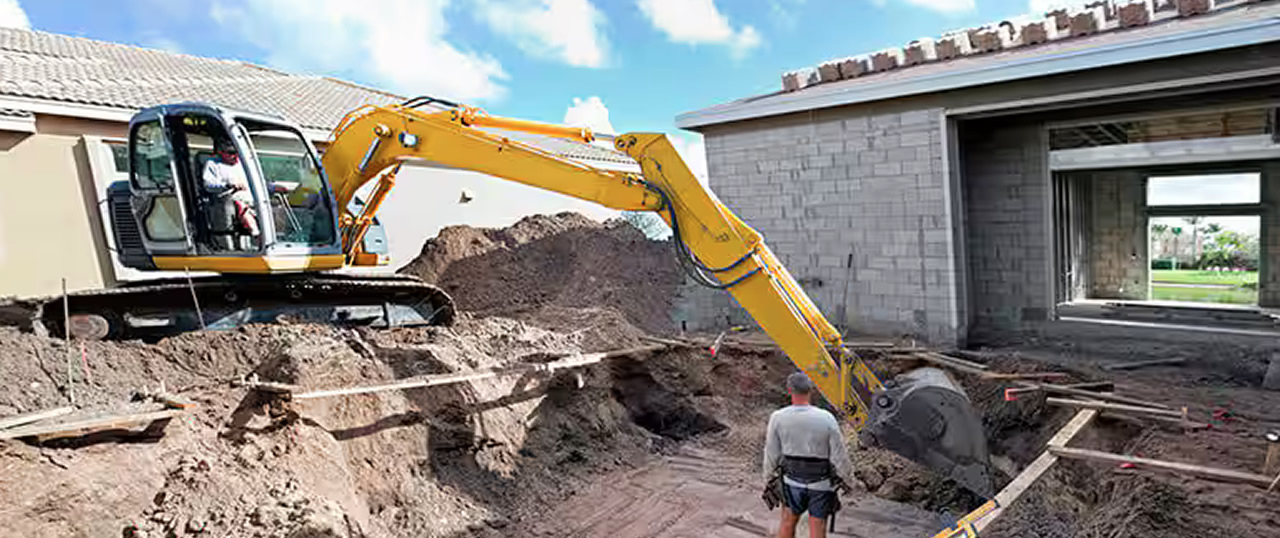 excavator doing house foundation