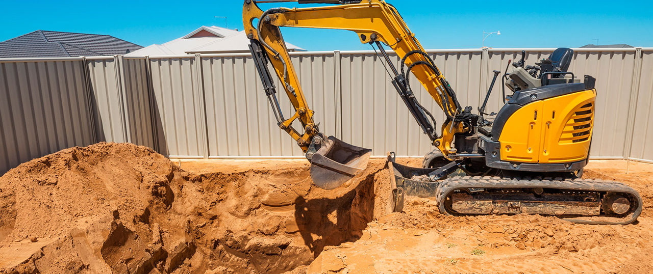 excavator digging pool